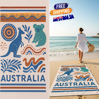 Australia-themed beach towel with kangaroo, koala, and Aboriginal patterns, and a woman on a beach.