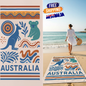 Australia-themed beach towel with kangaroo, koala, and Aboriginal patterns, and a woman on a beach.