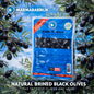 Packaged black olives with Marmarabirlik branding against an olive tree background